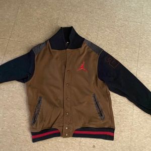 It is a Jordan varsity jacket size medium
